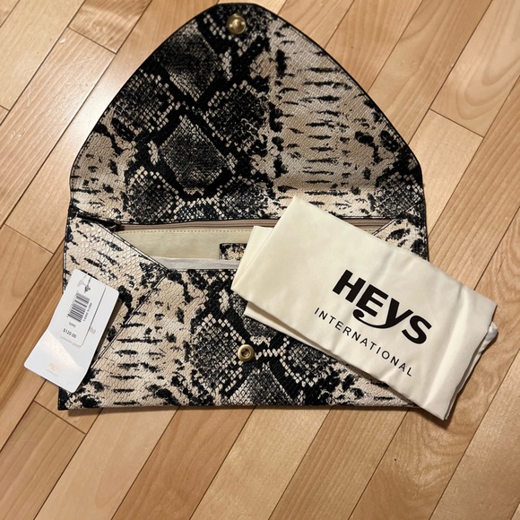 Heys clutch Hand Bag - Picture 2 of 3